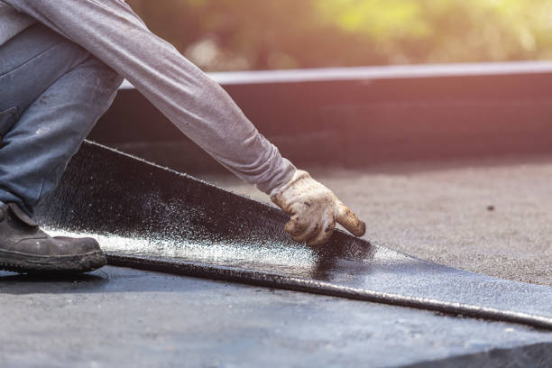 Professional Basement Waterproofing technician working in Corunna, IN